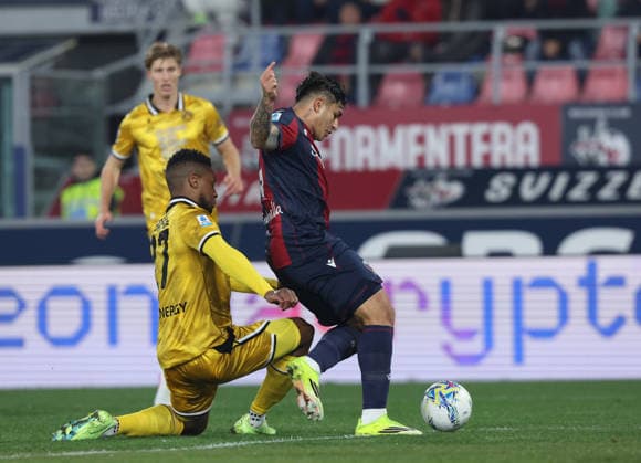 Bologna™s Santiago Castro fight for the ball with Udinese™s Christian Kabasele during the Serie A soccer match between Bologna and Udinese at the Renato Dall™Ara Stadium in Bologna -Monday, February 23, 2026. - Soccer .  Copyright: xGiannixSantandrea LaPressex