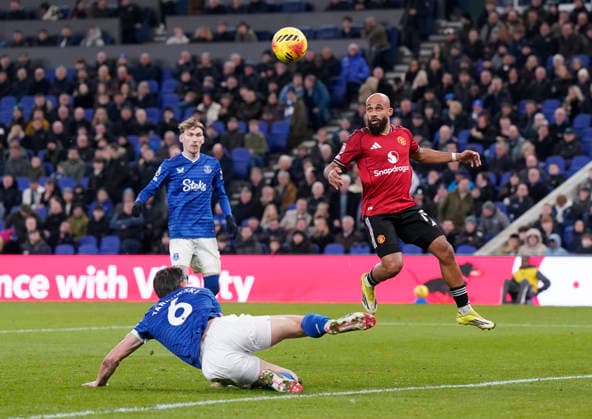 Liverpool, England, 23rd February 2026. James Tarkowski of Everton fails to stop the ball reaching Bryan Mbeumo of Manchester United, ManU during the Everton vs Manchester United Premier League match at Hill Dickinson Stadium, Liverpool. Picture credit should read: Andrew Yates Sportimage EDITORIAL USE ONLY. No use with unauthorised audio, video, data, fixture lists, club league logos or live services. Online in-match use limited to 120 images, no video emulation. No use in betting, games or single club league player publications. SPI_037_AY_Everton_Man_Utd SPI-4547-0036