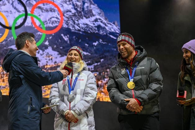 OLYMPICS - Winter Olympic Games, Olympische Spiele, Olympia, OS Milano Cortina 2026 INNSBRUCK,AUSTRIA,23.FEB.26 - OLYMPICS - Winter Olympic Games Milano Cortina 2026, Olympic Team Austria, medal celebration. Image shows Lukas Schweighofer (ORF), Sabine Payer and Benjamin Karl (AUT).  GEPAxpictures xDanielxSchoenherr