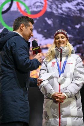 OLYMPICS - Winter Olympic Games, Olympische Spiele, Olympia, OS Milano Cortina 2026 INNSBRUCK,AUSTRIA,23.FEB.26 - OLYMPICS - Winter Olympic Games Milano Cortina 2026, Olympic Team Austria, medal celebration. Image shows Lukas Schweighofer (ORF) and Sabine Payer (AUT).  GEPAxpictures xDanielxSchoenherr