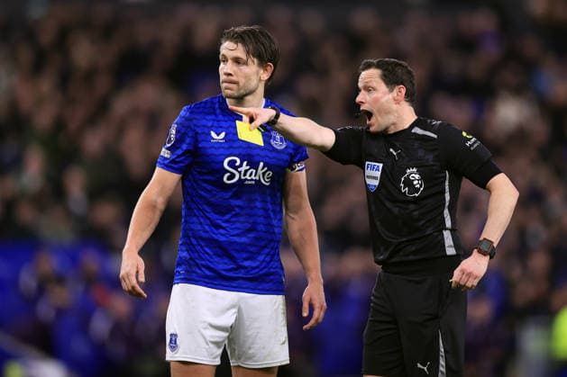 Everton v Manchester United, ManU 23 February 2026 - Premier League - Everton v Manchester United - Michael Keane of Everton receiving a yellow card from referee Darren England - Photo: Simon Stacpoole Offside. Merseyside UK Copyright: xSimonxStacpoolexOffside