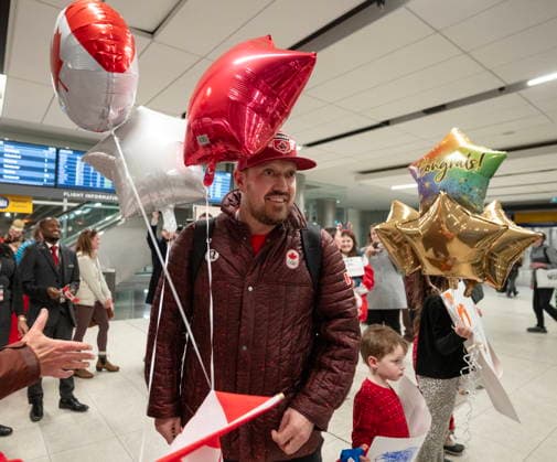 February 23, 2026, Calgary, Ab, CANADA: Canadian olympic curler and gold medalist Ben Hebert arrives at the Calgary International Airport after competing at the Milano Cortina Winter Olympics, Monday, Feb. 23, 2026. Canada News - February 23, 2026  - ZUMAc35_ 20260223_zaf_c35_116 Copyright: xToddxKorolx