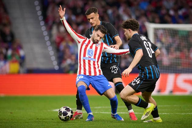 ATLETICO DE MADRID v CLUB BRUGGE KV. CHAMPIONS LEAGUE 2025 2026. ROUND KO PLAY-OFFS 2ND LEG MATCH. Atletico de Madrid s Alex Baena (c) and Club Brugge KV s Aleksandar Stankovic (l) and Kyriani Sabbe during Champions League 2025 2026, KO play-offs 2nd leg match. February 24 ,2026. (ALTERPHOTOS Jorge Ropero) MadridSpain  Copyright: xJorgexRoperox