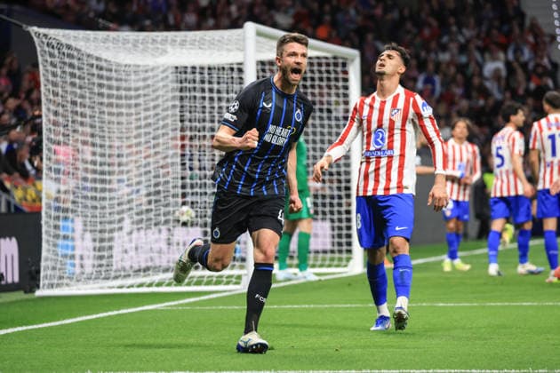 Spain - Atletico de Madrid vs Club Brugge KV - 24 02 2026 SPAIN, MADRID, FEBRUARY 24. Brandon Mechele of Brugge celebrates after Joel Ordonez of Brugge (out of frame) scored his team s opening goal from his assist and while Marc Pubill of Atletico de Madrid (R) looks dejected during the UEFA Champions League Knockout Play-off Second Leg football match between Atletico de Madrid and Club Brugge KV at Estadio Riyadh Air Metropolitano on February 24, 2026 in Madrid, Spain. Photo by Manuel Blondeau AOP.Press Madrid Riyadh Air Metropolitano Spain Copyright: x ManuelxBlondeau AOP.Pressx AOP20260224-0003