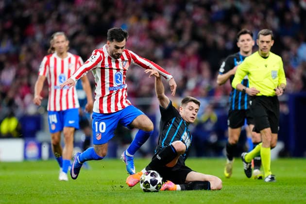 Atletico de Madrid v Club Brugge KV - UEFA Champions League 2025 26 League Knockout Play-off Second Leg Alex Baena left winger of Atletico de Madrid and Spain and Nicolo Tresoldi centre-forward of Brugge and Germany compete for the ball during the UEFA Champions League 2025 26 League Knockout Play-off Second Leg match between Atletico de Madrid and Club Brugge KV at Estadio Riyadh Air Metropolitano on February 24, 2026 in Madrid, Spain. Madrid Spain  Copyright: xJosexBretonx originalFilename:bretonhernandez-atletico260224_np9yw.jpg