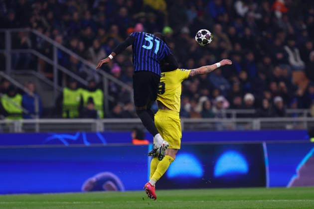 Yann Aurel Bisseck (Fc Internazionale) und Kasper Hogh (FK Bodo Glimt) battle for the ball, UEFA Champions League 2025 26 League Play-off second leg, FC Internazionale Milano v FK Bodo Glimt, Stadio Giuseppe Meazza (San Siro), February 24, 2026, Milan, Italy.