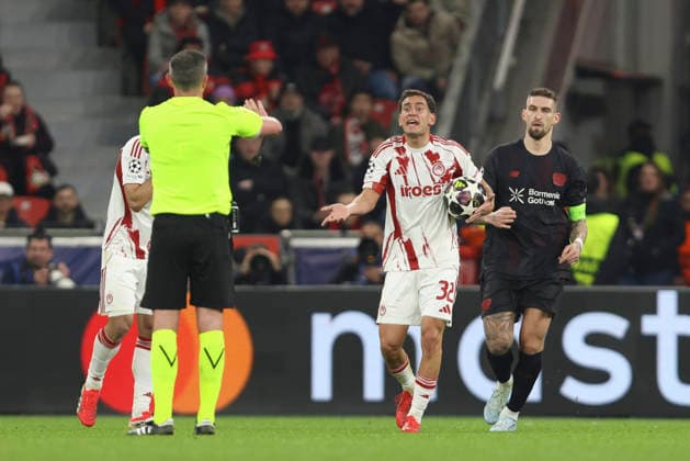 Santiago Hezze (Olympiacos FC) gestures during the UEFA Champions League 2025 26 League Knockout Play-off Second Leg match between Bayer 04 Leverkusen and Olympiacos FC at BayArena on February 24, 2026 in Leverkusen, Germany. (Photo by Oliver Kaelke DeFodi Images) -