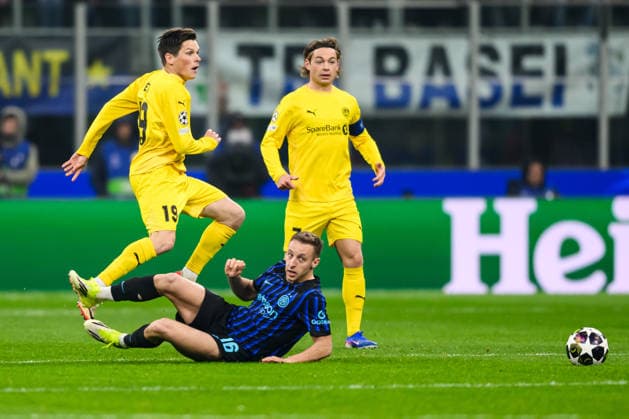 260224 Sondre Brunstad Fet of Bodo Glimt and Davide Frattesi of Inter during the UEFA Champions League football match between Inter and Bodo Glimt on February 24, 2026 in Milan. Photo: Marius Simensen BILDBYRAN COP 238 MM0057 bbeng football fotball fotboll soccer uefa champions league mesterligaen bodo glimt inter fc internazionale milano Copyright: MARIUSxSIMENSEN BB260224BB473