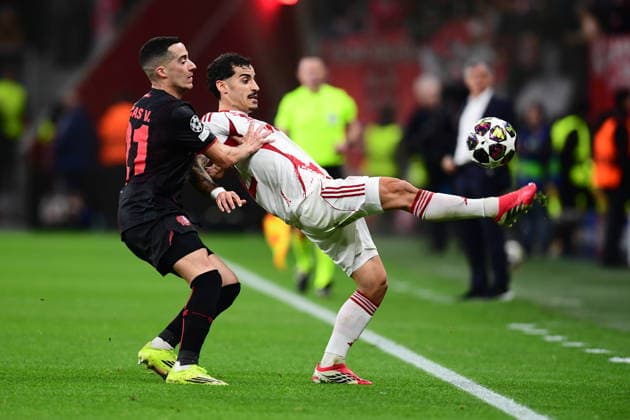 UEFA Champions League - Bayer 04 Leverkusen vs Olympiacos FC - Chiquinho of Olympiacos FC in action againstLucas Vazquez of Bayer 04 Leverkusen during the UEFA Champions League Play-Offs 2nd leg soccer match between Bayer 04 Leverkusen and Olympiacos FC in BayArena, Leverkusen, Germany, on 24 February 2026. IMAGO ONE INCH PRODUCTIONS LEVERKUSEN GERMANY Copyright: xONExINCHxPRODUCTIONSx 6868509