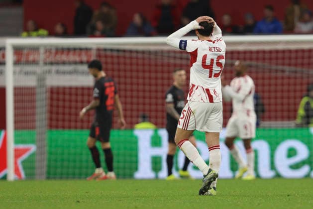 Panagiotis Retsos (Olympiacos FC) gestures, looks dejected during the UEFA Champions League 2025 26 League Knockout Play-off Second Leg match between Bayer 04 Leverkusen and Olympiacos FC at BayArena on February 24, 2026 in Leverkusen, Germany. (Photo by Oliver Kaelke DeFodi Images) -