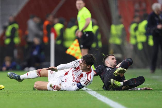 Panagiotis Retsos (Olympiacos FC) und Aleix Garcia (Bayer 04 Leverkusen) battle for the ball during the UEFA Champions League 2025 26 League Knockout Play-off Second Leg match between Bayer 04 Leverkusen and Olympiacos FC at BayArena on February 24, 2026 in Leverkusen, Germany. (Photo by Oliver Kaelke DeFodi Images) -