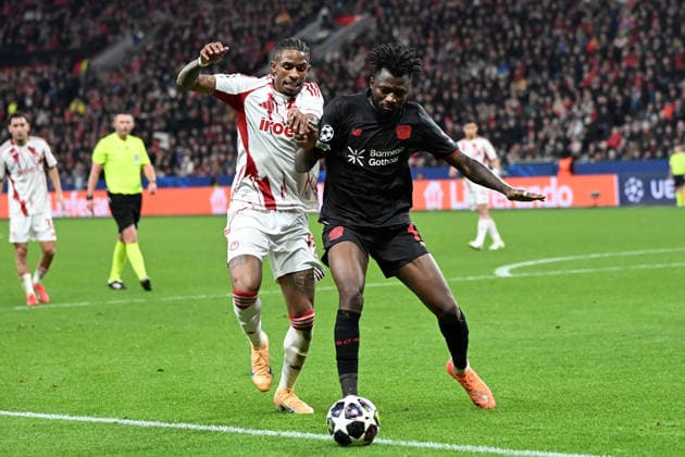 Andre Luiz (Olympiakos FC) und Edmond Tapsoba (Bayer 04 Leverkusen) im Zweikampf waehrend des Spiels der UEFA Champions League 2025 26, Play-offs, Rückspiel zwischen Bayer 04 Leverkusen und Olympiakos Piräus, BayArena am 24. February 2026 in Leverkusen, Deutschland. (Foto von Ralf Treese DeFodi Images) +++ Andre Luiz (Olympiakos FC) und Edmond Tapsoba (Bayer 04 Leverkusen) battle for the ball during the UEFA Champions League 2025 26 League Knockout Play-off Second Leg match between Bayer 04 Leverkusen and Olympiacos FC at BayArena on February 24, 2026 in Leverkusen, Germany. (Photo by Ralf Treese DeFodi Images) -