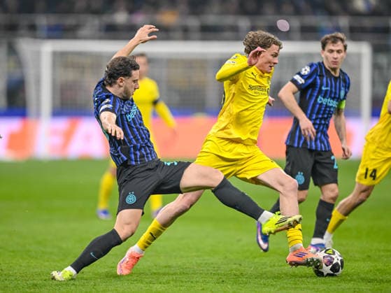 Carlos Augusto (FC Internazionale Milano) und Isak Dybvik Määttä (FK Bodo Glimt) battle for the ball during the UEFA Champions League 2025 26 League Knockout Play-off Second Leg match between FC Internazionale Milano and FK Bodo Glimt at Stadio San Siro on February 24, 2026 in Milan, Italy. (Photo by Harry Langer DeFodi Images) -
