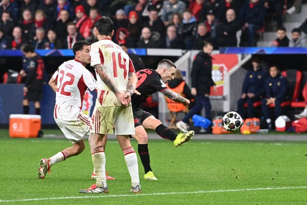 Alejandro GRIMALDO (LEV) Torschuss, Aktion, Zweikampf, Fussball Champions League, Play Offs, Bayer 04 Leverkusen (LEV) - Olympiakos Piraeus (PI) 0-0 am 24.02.2026 in Leverkusen Deutschland. UEFA regulations prohibit any use of photographs as image sequences and or quasi-video Â