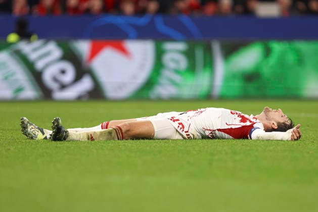 Panagiotis Retsos (Olympiacos FC) looks dejected during the UEFA Champions League 2025 26 League Knockout Play-off Second Leg match between Bayer 04 Leverkusen and Olympiacos FC at BayArena on February 24, 2026 in Leverkusen, Germany. (Photo by Oliver Kaelke DeFodi Images) -