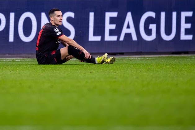 LEVERKUSEN, GERMANY - FEBRUARY 24: Lucas Vazquez of Bayer 04 Leverkusen sits on the ground due to an injury during the UEFA Champions League 2025 26 League Knockout Play-off Second Leg match between Bayer 04 Leverkusen and Olympiacos FC at BayArena on February 24, 2026 in Leverkusen, Germany. (Photo by Rene Nijhuis) SPO  Copyright: xRenexNijhuis