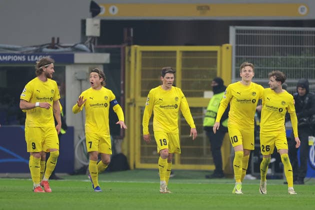 Milan, Italy, 24th February 2026. Hakon Evjen of FK Bodo Glimt celebrates with team mates after scoring to give the side a 2-0 lead during the Internazionale vs FK Bodo Glimt UEFA Champions League Play Off 2nd Leg match at Giuseppe Meazza, Milan. Picture credit should read: Jonathan Moscrop Sportimage EDITORIAL USE ONLY. No use with unauthorised audio, video, data, fixture lists, club league logos or live services. Online in-match use limited to 120 images, no video emulation. No use in betting, games or single club league player publications. SPI_044_INTER_BODOGLIMT_UCL_ SPI-4550-0044