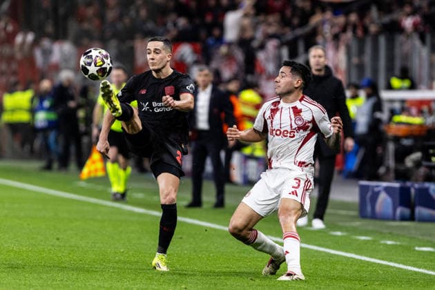 UEFA Champions League: Bayer 04 Leverkusen - Olympiacos FC; 24.02.2026 Lucas Vazquez (Bayer 04 Leverkusen, 21), Francisco Ortega (Olympiacos FC, 3) UEFA Champions League: Bayer 04 Leverkusen - Olympiacos FC; BayArena, Leverkusen; 24.02.2026 Copyright: xBEAUTIFULxSPORTS Buriakovx