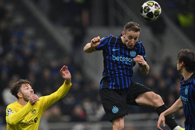 CALCIO - UEFA Champions League - Inter - FC Internazionale vs FK Bodo Glimt Fredrik Andre Bjorkan of FK Bodo Glimt and Davide Frattesi of F.C. Inter are in action during the UEFA Champions League 2025 26 League Knockout Play-off Second Leg match between F.C. Inter and FK Bodo Glimt at the San Siro Stadium on February 24, 2026 in Milan, Italy. Milan Italy  Copyright: xIPAxSport ABACAx
