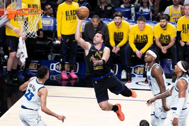 February 24, 2026, Los Angeles, California, USA: Los Angeles LakersÃ¢â‚¬â ¢ Luka DonÄÂiÄ¡ (77) shoots against the Orlando Magic during an NBA, Basketball Herren, USA basketball game at Crypto.com Arena on Tuesday, Feb. 24, 2026 in Los Angeles. Los Angeles USA - ZUMAc68_ 20260224_zaf_c68_005 Copyright: xRingoxChiux