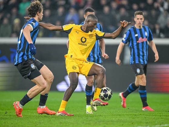 Giorgio Scalvini (Atalanta BC), Serhou Guirassy (Borussia Dortmund) and Isak Hien (Atalanta BC) battle for the ball during the UEFA Champions League 2025 26 League Knockout Play-off Second Leg match between Atalanta BC and Borussia Dortmund at Stadio di Bergamo on February 25, 2026 in Bergamo, Italy. (Photo by Harry Langer DeFodi Images) -