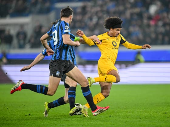Berat Djimsiti (Atalanta BC), Marten de Roon (Atalanta BC) and Karim Adeyemi (Borussia Dortmund) battle for the ball during the UEFA Champions League 2025 26 League Knockout Play-off Second Leg match between Atalanta BC and Borussia Dortmund at Stadio di Bergamo on February 25, 2026 in Bergamo, Italy. (Photo by Harry Langer DeFodi Images) -