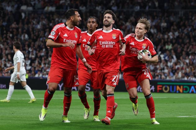 Madrid, Spain February 25, 2026: FBL-UEFA Champions League 2025-26 Real Madrid - SL Benfica Vangelis Pavlidis (S.L.Benfica), Rafa (S.L.Benfica), Andreas Schjelderup (S.L.Benfica) celebrates after scoring a goal to 0:1 during the UEFA Champions League 2025-26 knockout play-offs match between Real Madrid and SL Benfica at the Santiago BernabÃ u Stadium on February 25, 2026 in Madrid, Spain Copyright: JoaquimxFerreira