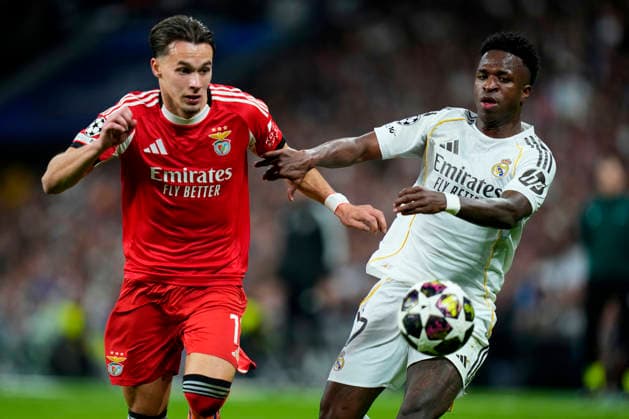 ESP: Real Madrid - SL Benfica. UEFA Champions League. Round of 16. Second Leg. Vinicius Junior of Real Madrid CF and Amar Dedic of SL Benfica during the UEFA Champions League match, between Real Madrid and SL Benfica, Round of 16, second leg, played at Santiago Bernabeu Stadium on February 25, 2026 in Madrid, Spain. kpng Copyright: xCesarxCebollax xPRESSINPHOTOx PS_260225_RMA_BEN_015