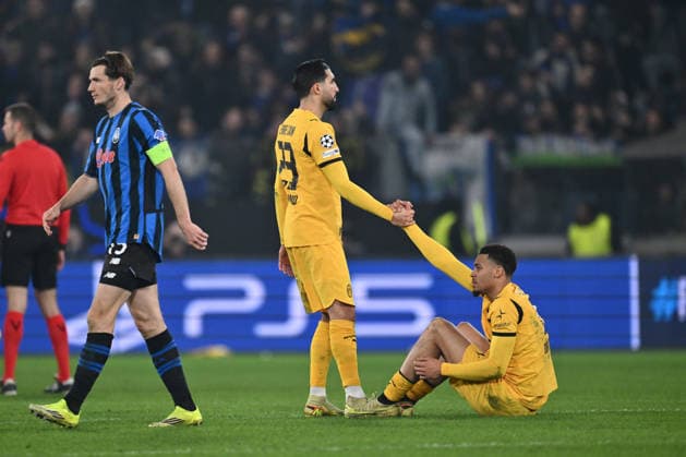 Atalanta BC v Borussia Dortmund - UEFA Champions League 2025 26 League Knockout Play-off Second Leg Emre Can of Borussia Dortmund and Felix Nmecha of Borussia Dortmund appear disappointed at the end of the UEFA Champions League 2025 26 League Knockout Play-off Second Leg match between Atalanta B.C. and Borussia Dortmund at the Bergamo Stadium in Bergamo, Italy, on February 25, 2026. Bergamo Italy Italy  Copyright: xDomenicoxCippitellix originalFilename:cippitelli-atalanta260225_npajw.jpg