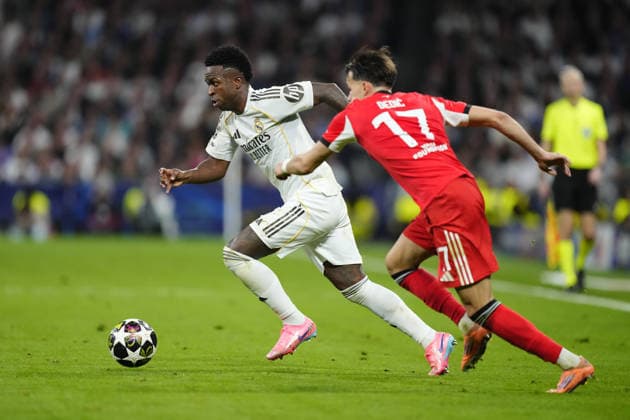 Real Madrid C.F. v SL Benfica - UEFA Champions League MADRID, SPAIN - FEBRUARY 25: Vinicius Junior left winger of Real Madrid and Brazil in action during the UEFA Champions League 2025 26 League Knockout Play-off Second Leg match between Real Madrid C.F. and SL Benfica at Estadio Santiago Bernabeu on February 25, 2026 in Madrid, Spain. Jose Hernandez Anadolu Madrid Spain. Editorial use only. Please get in touch for any other usage.  Copyright: x2026xAnadoluxJosexHernandezx
