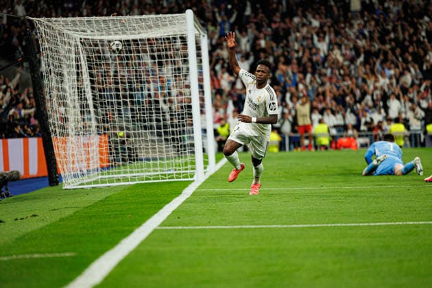 Vinicius Vini Junior seen celebrating after scoring goal during Champions League knock out play off game between teams of Real Madrid CF and SL Benfica (Maciej Rogowski Ball Raw Images) Madrid Bernabeu Spain Copyright: xMaciejxRogowskix maciejrogowski_real_benfica_2526-03