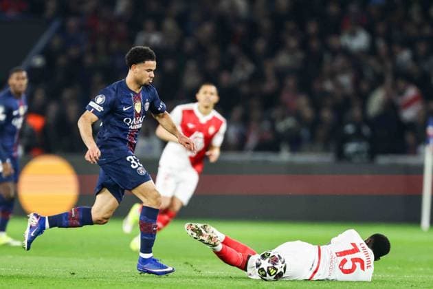 Paris Saint-Germain (PSG) v AS Monaco - UCL PARIS, FRANCE - FEBRUARY 25: Warren Zaire-Emery of Paris Saint-Germain (L) and Lamine Camara of AS Monaco (R) during the UEFA Champions League play-off second leg football match between Paris Saint-Germain (PSG) and AS Monaco at the Parc des Princes stadium in Paris. Ibrahim Ezzat Anadolu Paris France. Editorial use only. Please get in touch for any other usage.  Copyright: x2026xAnadoluxÄ°brahimxEzzatx