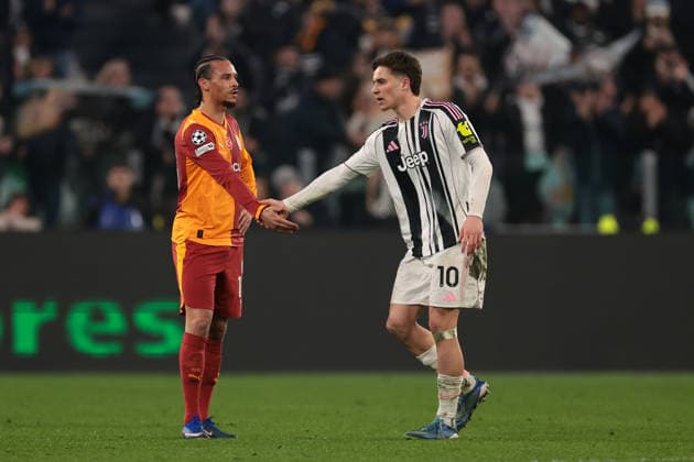 Turin, Italy, 25th February 2026. Kenan Yildiz of Juventus shakes hands with Leroy Sane of Galatasaray SK as he leaves the field of play to be substituted during the Juventus vs Galatasaray UEFA Champions League Knockout Play Off 2nd Leg match at Allianz Stadium, Turin. Picture credit should read: Jonathan Moscrop Sportimage EDITORIAL USE ONLY. No use with unauthorised audio, video, data, fixture lists, club league logos or live services. Online in-match use limited to 120 images, no video emulation. No use in betting, games or single club league player publications. SPI_047_JUVE_GALATASARAY_UCL_ SPI-4551-0047