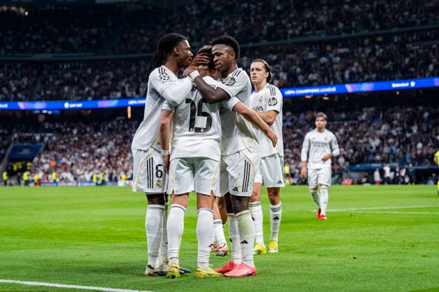 Real Madrid CF v SL Benfica - UEFA Champions League 2025 26 League Knockout Play-off Second Leg Arda Guler of Real Madrid (C) celebrates his goal with Eduardo Camavinga (L) and Vinicius Junior (R) that was later disallowed by VAR during the UEFA Champions League 2025 26 League Knockout Play-off Second Leg match between Real Madrid C.F. and SL Benfica at Estadio Santiago Bernabeu on February 25, 2026 in Madrid, Spain. Madrid Estadio Santiago Bernabeu Madrid Spain Copyright: xAlbertoxGardinx AGardin_20260225_Foot_Champ_Rea_Mad_Ben_0931