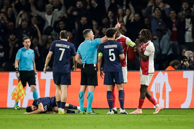 Paris, France - February 25: Referee Istvan Kovacs (C) shows a red card for Mamadou Coulibaly of Monaco (R) during the UEFA Champions League 2025 26 League Knockout Play-off Second Leg match between Paris Saint-Germain and AS Monaco at Parc des Princes on February 25, 2026 in Paris, France. (Photo by Antonio Borga Eurasia Images) Paris Parc des Princes France