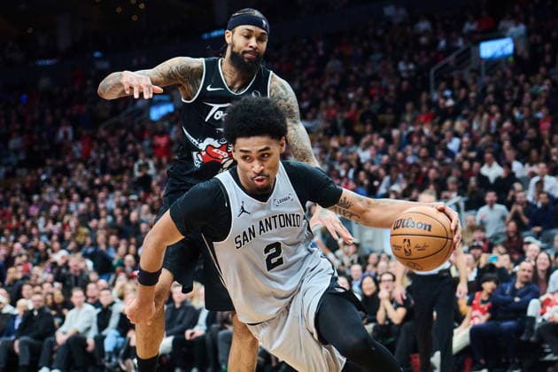February 25, 2026, Toronto, On, Canada: San Antonio Spurs Dylan Harper (2) drives past Toronto Raptors Brandon Ingram (3) during second half NBA, Basketball Herren, USA basketball action in Toronto, on Wednesday, Feb. 25, 2026. Canada News - February 25, 2026 - ZUMAc35_ 20260225_zaf_c35_110 Copyright: xSammyxKoganx