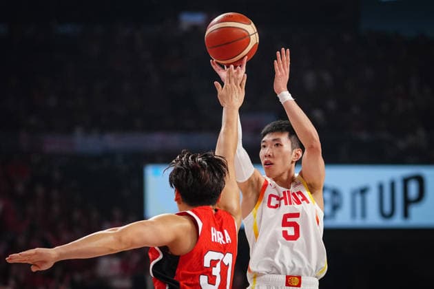 (260226) -- OKINAWA, Feb. 26, 2026 -- Liao Sanning (R) of China shoots during the Group B match between China and Japan at the FIBA Basketball World Cup Asian Qualifiers in Okinawa, Japan, Feb. 26, 2026. ) (SP)JAPAN-OKINAWA-BASKETBALL-FIBA WORLD CUP-ASIAN QUALIFIERS-CHN VS JPN JiaxHaocheng 