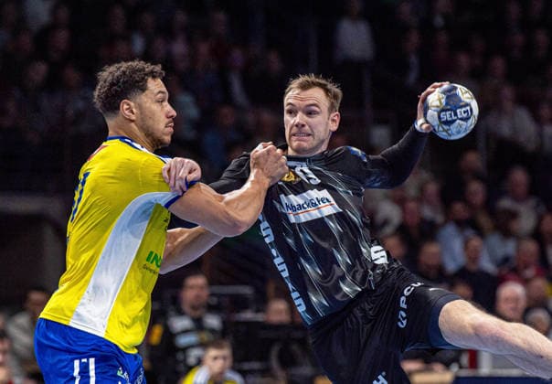 Handball, Herren, Saison 2025 2026, Champions League (Gruppe A, 12. Spieltag), Füchse Berlin - Industria Kielce, v.l. Theo Monar (Kielce), Mathias Gidsel (Füchse Berlin), 26.02.2026, Copyright: xSebastianxRäppold MatthiasxKochx