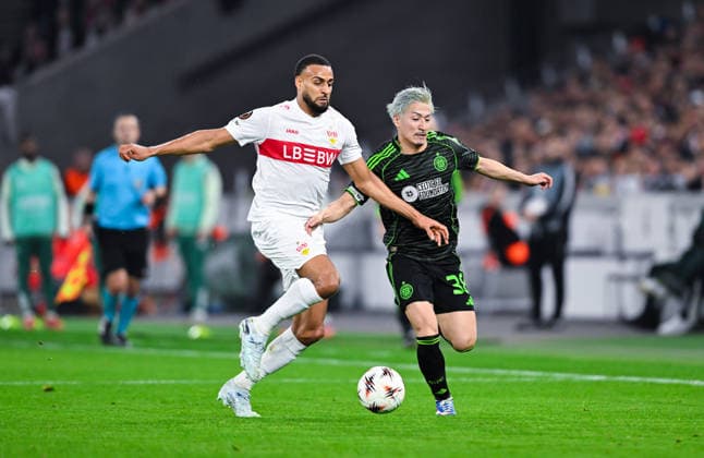 Josha Vagnoman (VfB Stuttgart) and Daizen Maeda (Celtic FC) battle for the ball during the UEFA Europa League 2025 26 Knockout Play-off Second Leg match between VfB Stuttgart and Celtic FC at Stuttgart Arena on February 26, 2026 in Stuttgart, Germany. (Photo by Silas Schueller DeFodi Images) -