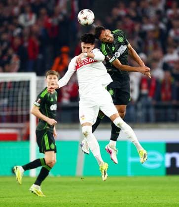 Auston Trusty of Celtic and Atakan Karazor of Stuttgart. Stuttgart v Celtic, UEFA Europa League, Knockout Round Play Offs, Second Leg, Football, MHP Arena, Stuttgart, Germany - 26 Feb 2026Stuttgart MHP Arena Germany EDITORIAL USE ONLY No use with unauthorised audio, video, data, fixture lists, club league logos or live services. Online in-match use limited to 120 images, no video emulation. No use in betting, games or single club league player publications.  Copyright: xJamesxMarsh Shutterstockx 16701577bm