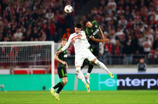 Auston Trusty of Celtic and Atakan Karazor of Stuttgart. Stuttgart v Celtic, UEFA Europa League, Knockout Round Play Offs, Second Leg, Football, MHP Arena, Stuttgart, Germany - 26 Feb 2026Stuttgart MHP Arena Germany EDITORIAL USE ONLY No use with unauthorised audio, video, data, fixture lists, club league logos or live services. Online in-match use limited to 120 images, no video emulation. No use in betting, games or single club league player publications.  Copyright: xJamesxMarsh Shutterstockx 16701577bp