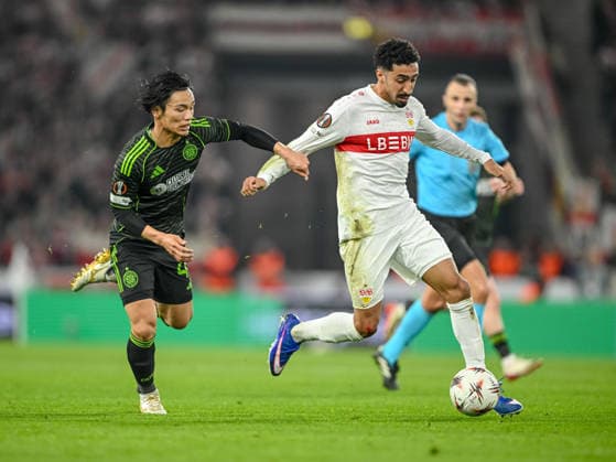 Reo Hatate (Celtic FC) and Tiago Tomas (VfB Stuttgart) battle for the ball during the UEFA Europa League 2025 26 Knockout Play-off Second Leg match between VfB Stuttgart and Celtic FC at Stuttgart Arena on February 26, 2026 in Stuttgart, Germany. (Photo by Harry Langer DeFodi Images) -