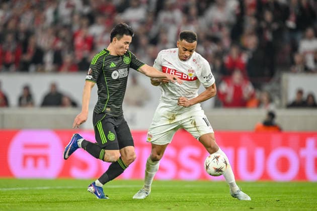 Reo Hatate (Celtic FC) and Jamie Leweling (VfB Stuttgart) battle for the ball during the UEFA Europa League 2025 26 Knockout Play-off Second Leg match between VfB Stuttgart and Celtic FC at Stuttgart Arena on February 26, 2026 in Stuttgart, Germany. (Photo by Harry Langer DeFodi Images) -