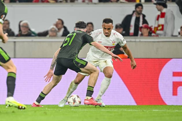 Colby Donovan (Celtic FC) and Jamie Leweling (VfB Stuttgart) battle for the ball during the UEFA Europa League 2025 26 Knockout Play-off Second Leg match between VfB Stuttgart and Celtic FC at Stuttgart Arena on February 26, 2026 in Stuttgart, Germany. (Photo by Harry Langer DeFodi Images) -