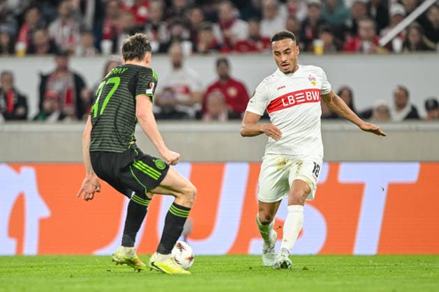 Dane Murray (Celtic FC) and Jamie Leweling (VfB Stuttgart) battle for the ball during the UEFA Europa League 2025 26 Knockout Play-off Second Leg match between VfB Stuttgart and Celtic FC at Stuttgart Arena on February 26, 2026 in Stuttgart, Germany. (Photo by Harry Langer DeFodi Images) -
