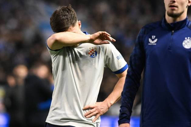 Dinamo s Mateo Lisica looks dejected after a soccer game between Belgian team KRC Genk and Croatian GNK Dinamo Zagreb, Thursday 26 February 2026 in Genk, in the play-off for the knockout phase of the UEFA Europa League tournament. Genk won the first leg 1-3. JILLxDELSAUX  x165503920x