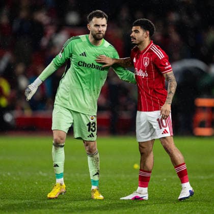 26th February 2026; The City Ground, Nottingham, England; UEFA Europa League Football, Nottingham Forest versus Fenerbahce; Tarik Cetin of Fenerbahce SK congratulates Morgan Gibbs-White of Nottingham Forest after the final whistle  GodfreyxPitt Content restricted for UK based newspaper