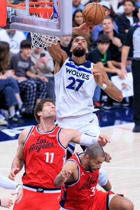 February 26, 2026, Inglewood, California, USA: Rudy Gobert 27 of the Minnesota Timberwolves goes up for a rebound against Brook Lopez 11 and Nicolas Batum 33 of the Los Angeles Clippers during a regular season NBA, Basketball Herren, USA game on Thursday February 26, 2026 at Intuit Dome Arena in Inglewood, California. Clippers lose to Timberwolves, 88-94. JAVIER ROJAS PI Inglewood USA - ZUMAp124 20260226_zaa_p124_062 Copyright: xJavierxRojasx