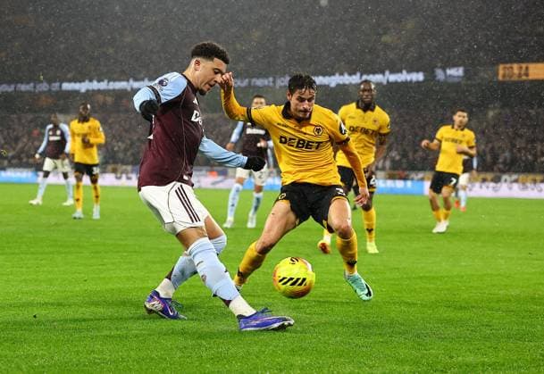 Jadon sancho of Aston Villa and Hugo Bueno of Wolverhampton Wanderers Wolverhampton Wanderers v Aston Villa, Premier League, Football, Molineux, Wolverhampton, UK - 27 Feb 2026Wolverhampton Molineux United Kingdom EDITORIAL USE ONLY No use with unauthorised audio, video, data, fixture lists, club league logos or live services. Online in-match use limited to 120 images, no video emulation. No use in betting, games or single club league player publications. Copyright: xMichaelxZemanek Shutterstockx 16701657m