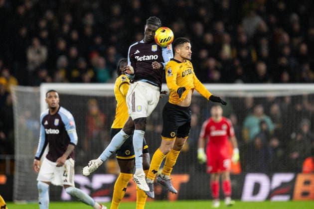 27th February 2026; Molineux Stadium, Wolverhampton, West Midlands, England; Premier League Football, Wolverhampton Wanderers versus Aston Villa; Amadou Onana of Aston Villa wins an aerial duel with Joao Gomes of Wolverhampton Wanderers  GodfreyxPitt Content restricted for UK based newspaper